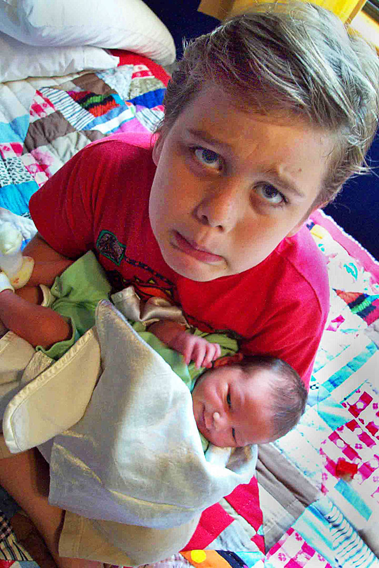 My two sons, new baby in the house
