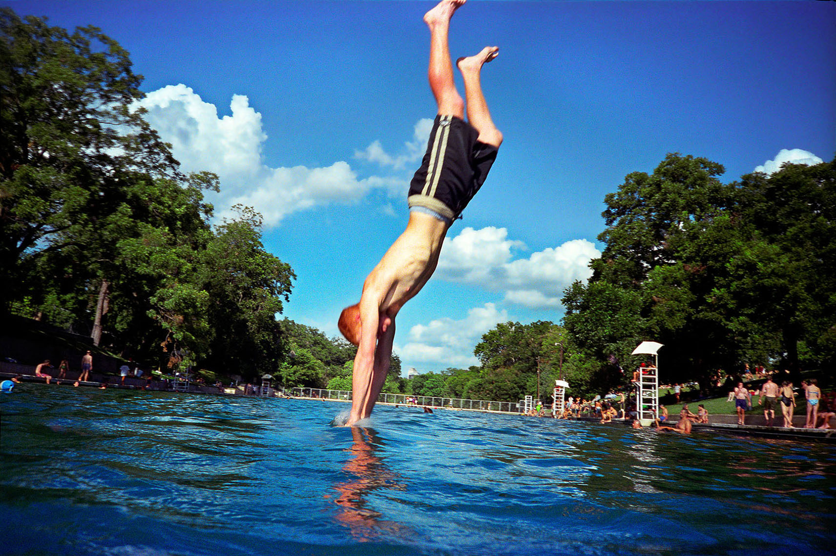 1146Barton Springs, Spring fed pool, boy diving, breaking water surface