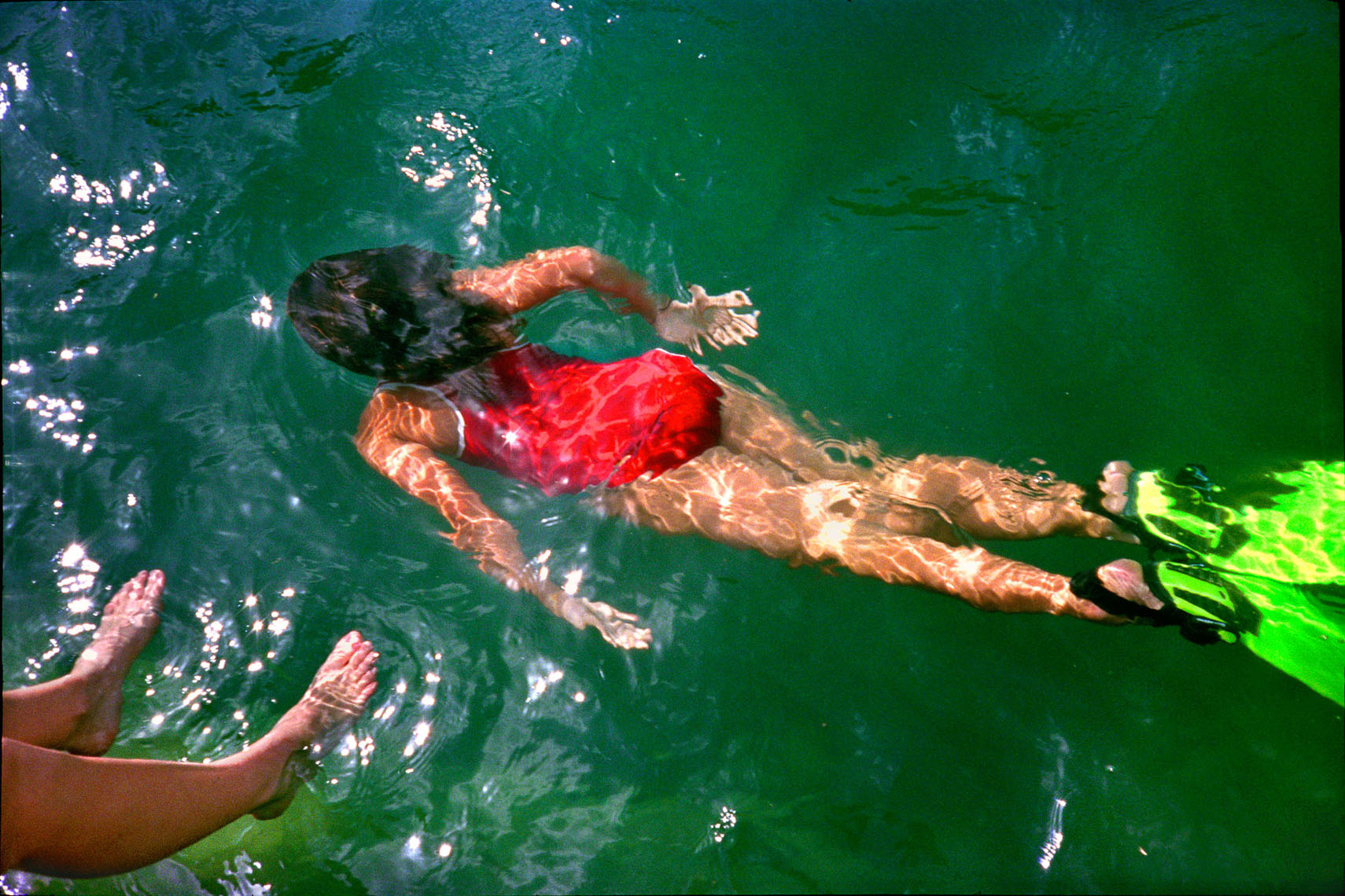 1160Barton Springs, Spring fed pool, girl underwater red bathing suit, green fins
